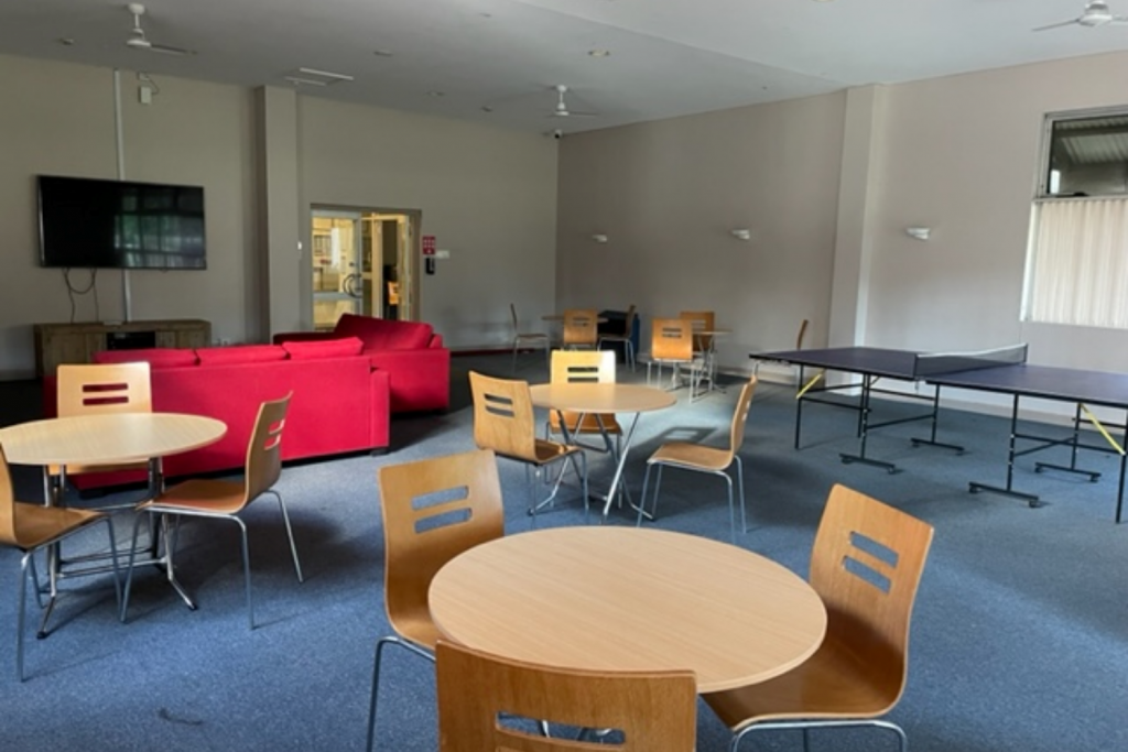 Weerona Student Accommodation Wollongong Living Area Lounge Room University students with ping pong table